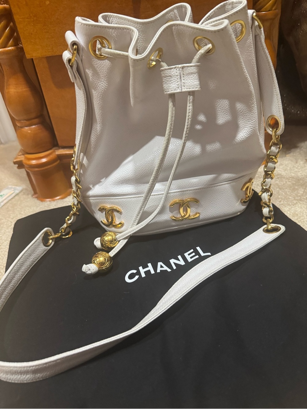 CHANEL White Leather Drawstring Bucket Bag with Gold CC Hardware